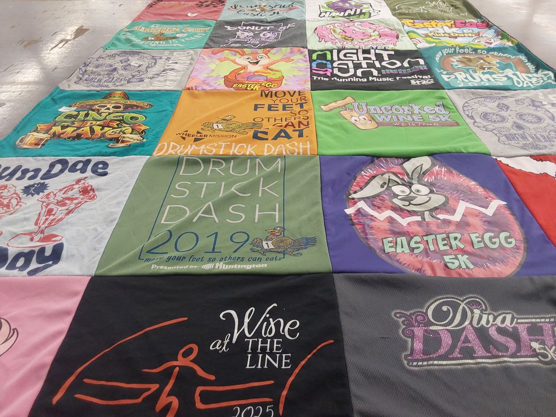 T-shirt quilt with running, music themes by Jeri from IN