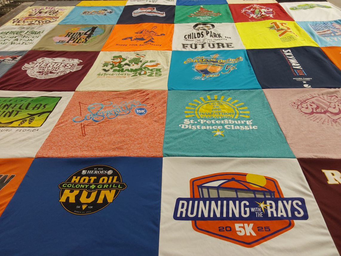 T-shirt quilt with running, local events themes by Susan from FL