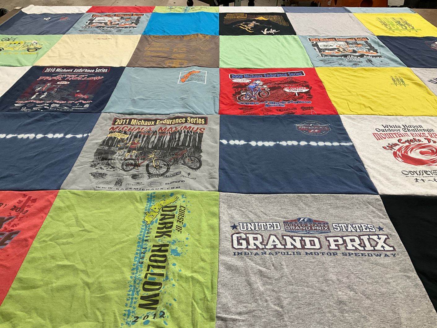 T-shirt quilt with mountain biking, motor sports themes by Joseph from PA