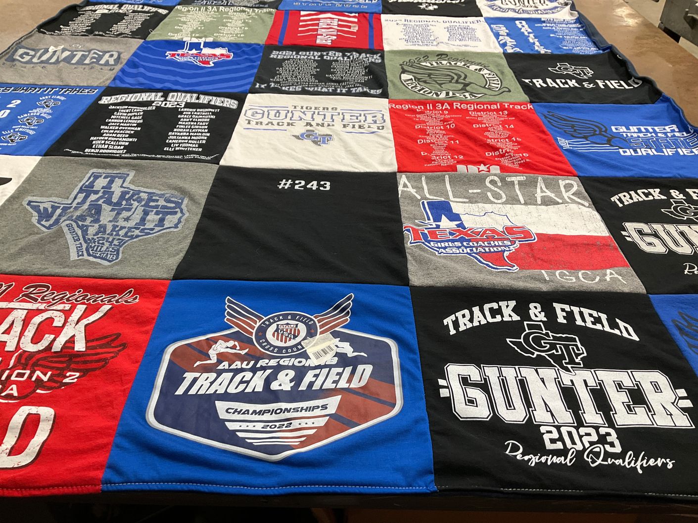 T-shirt quilt featuring gunter track and field by Angela from TX