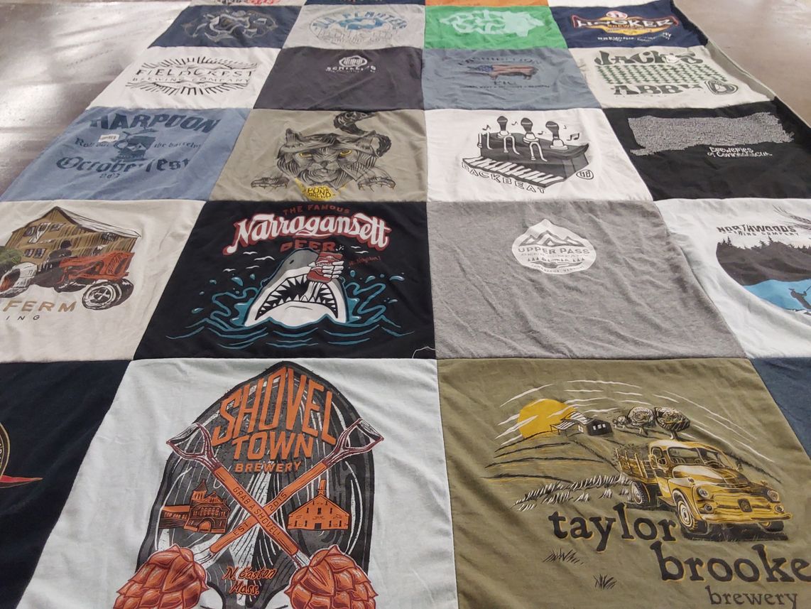 T-shirt quilt with breweries, festivals themes by Cheryle from CT