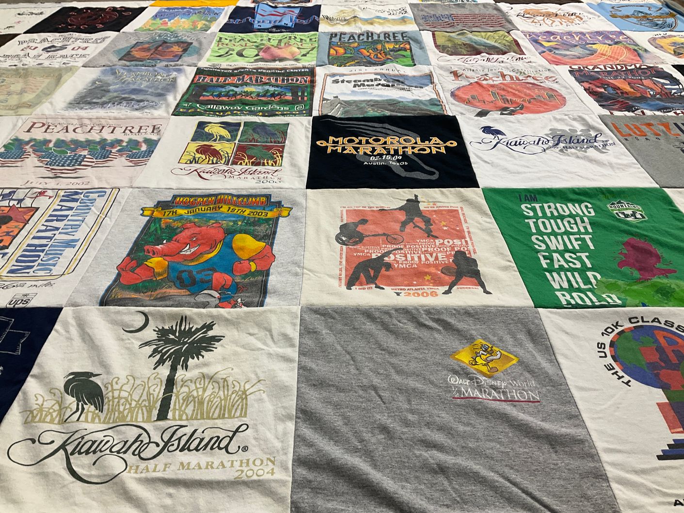 T-shirt quilt with running, marathon themes by Arthur from GA