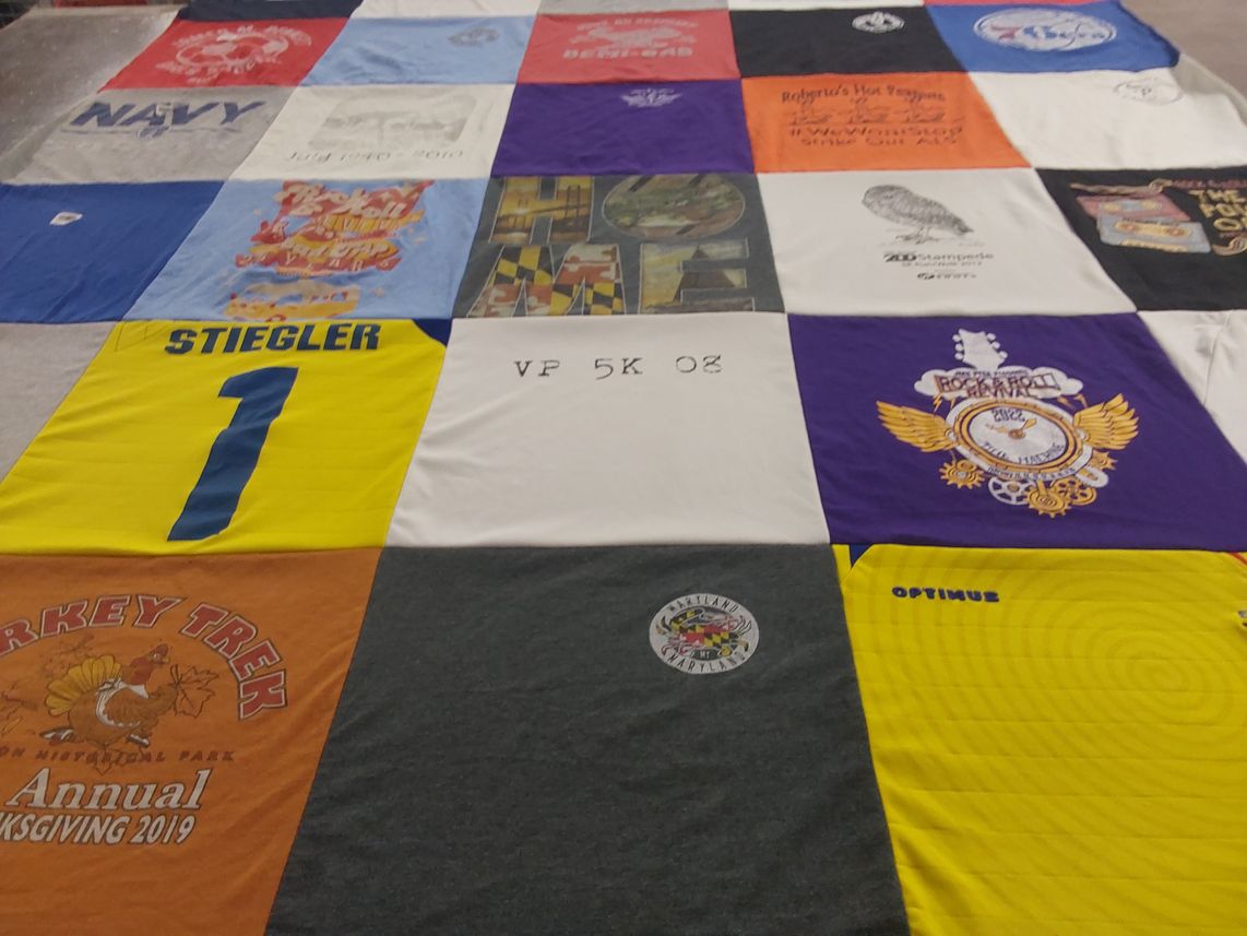 T-shirt quilt with sports, music themes by Brian from MD
