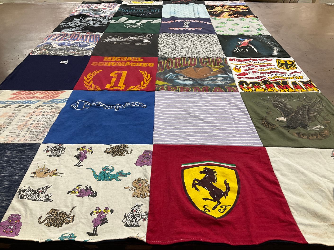 T-shirt quilt with racing, sports themes by Doris from CT