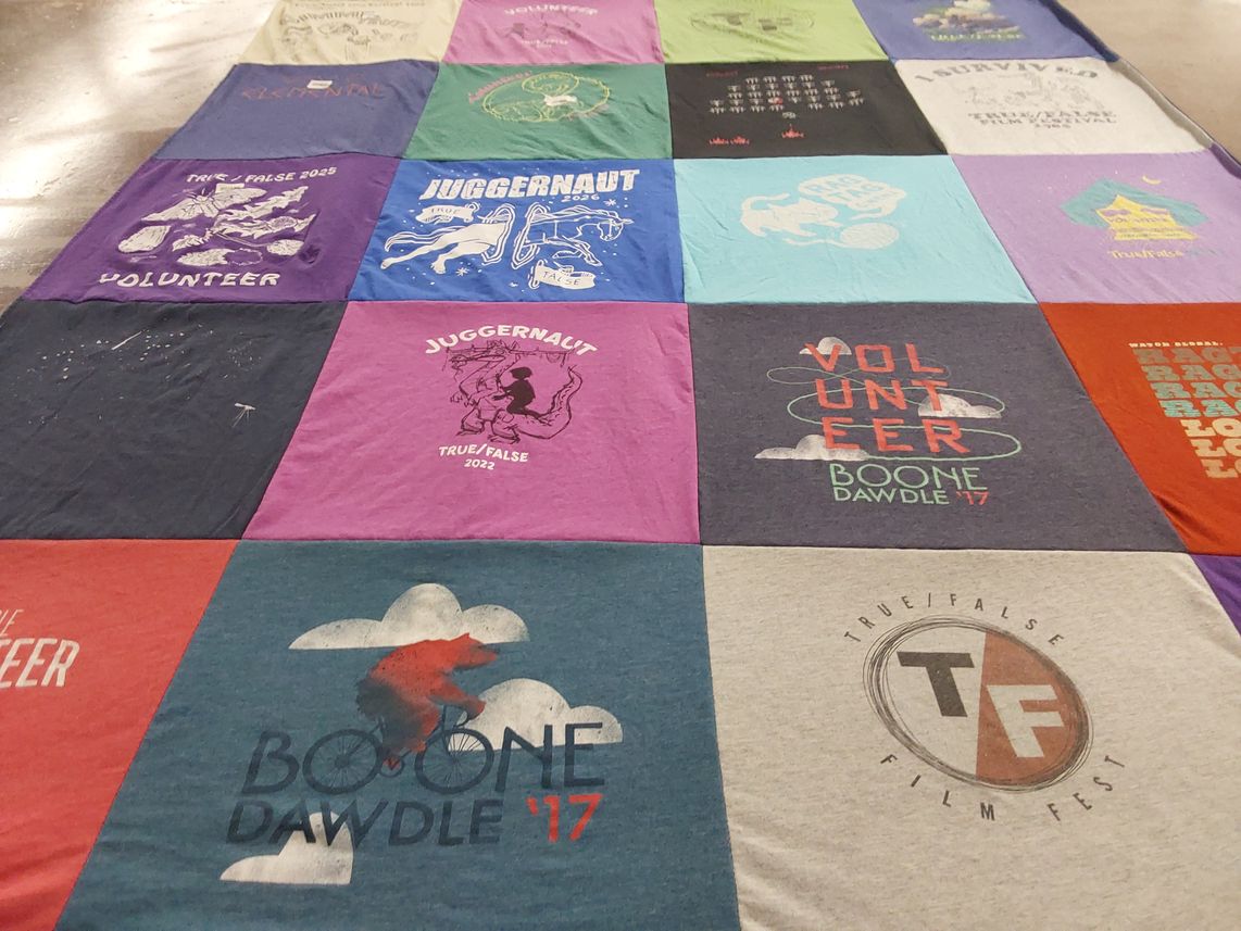 T-shirt quilt with filmmaking, events themes by Donna from MO
