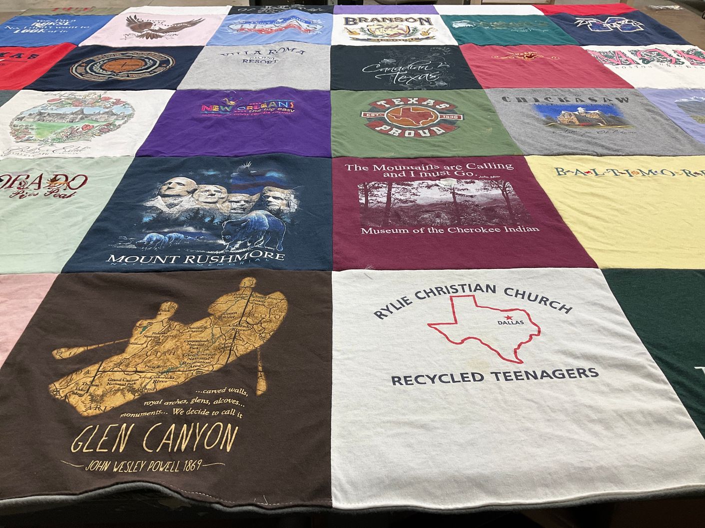 T-shirt quilt with travel, history themes by Marinell from TX