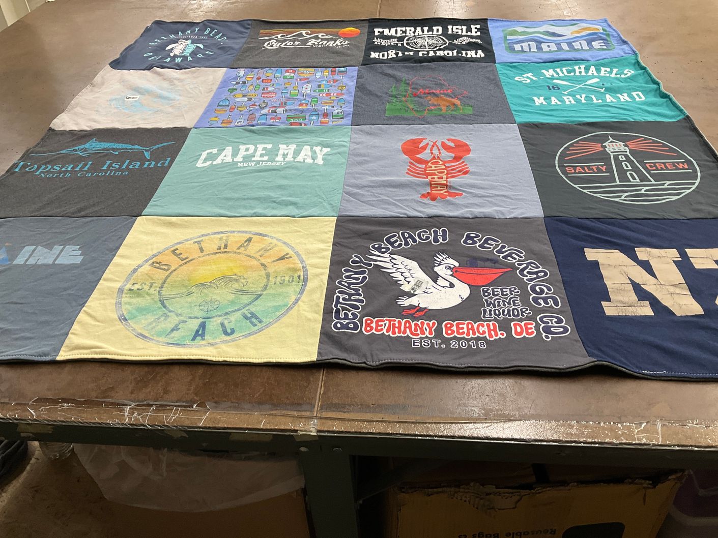 T-shirt quilt with beach, travel themes by Danielle from VA