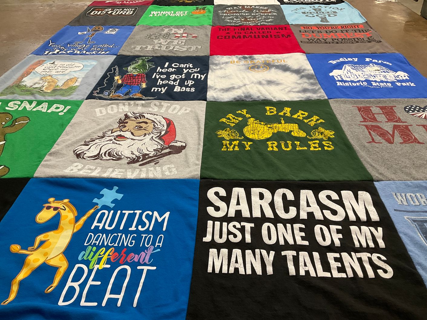 T-shirt quilt with humor, autism awareness themes by Thomas from FL
