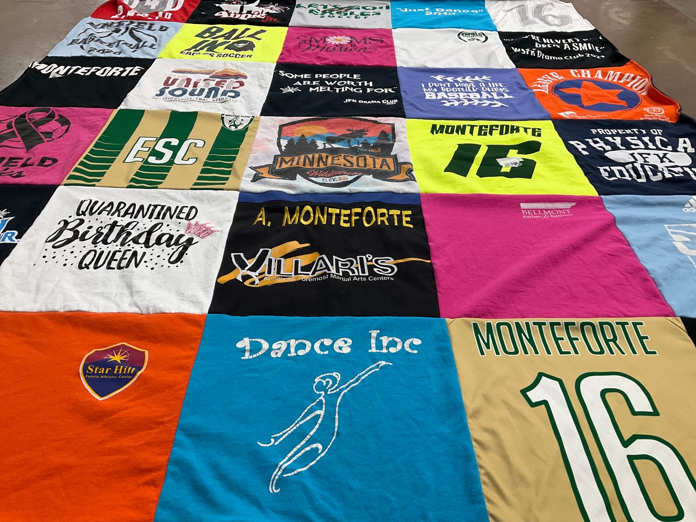 T-shirt quilt with soccer, dance themes by Kari from CT