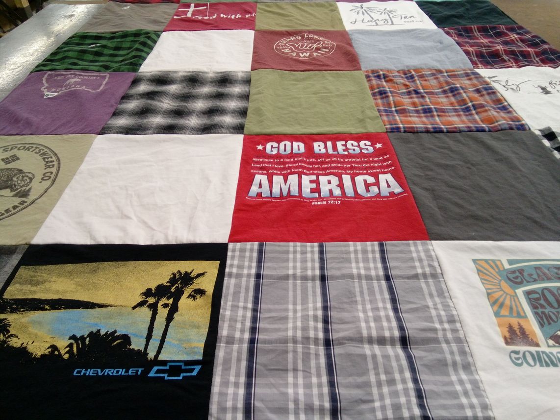 T-shirt quilt with travel, outdoors themes by Christine from CA