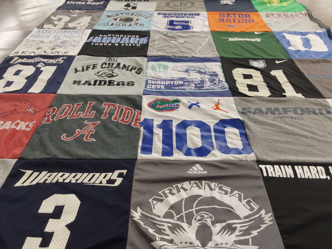 T-shirt quilt featuring university of alabama football team, university of arkansas basketball team by Normatk from AL