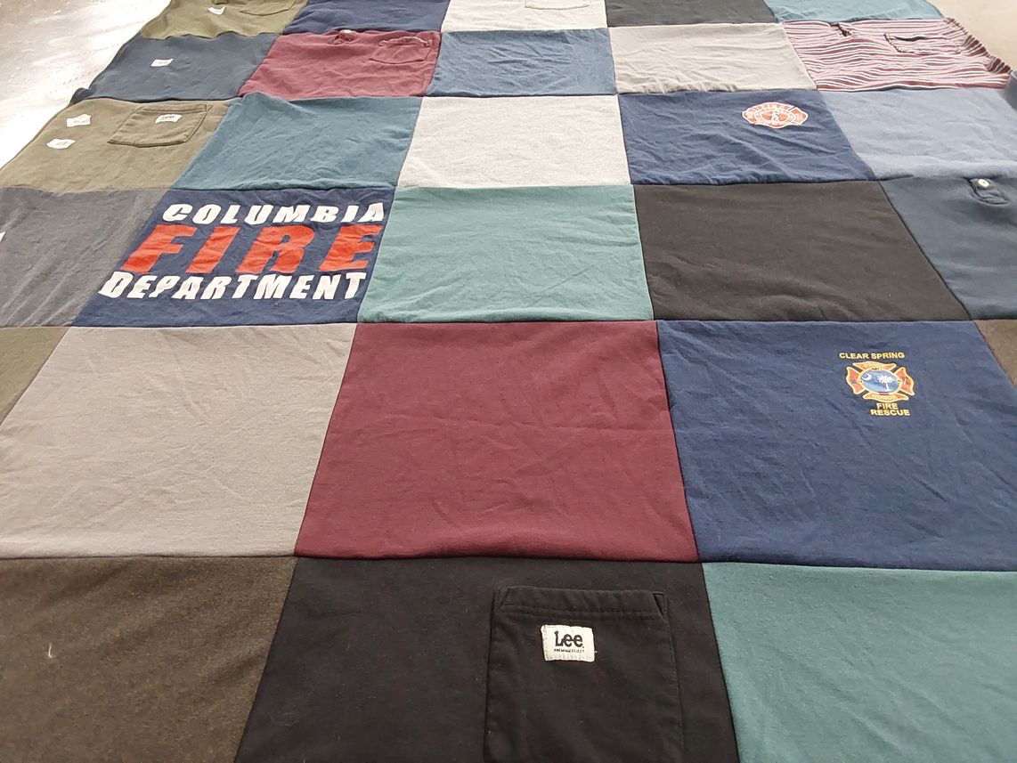 T-shirt quilt with firefighting, emergency services themes by Brittany from SC