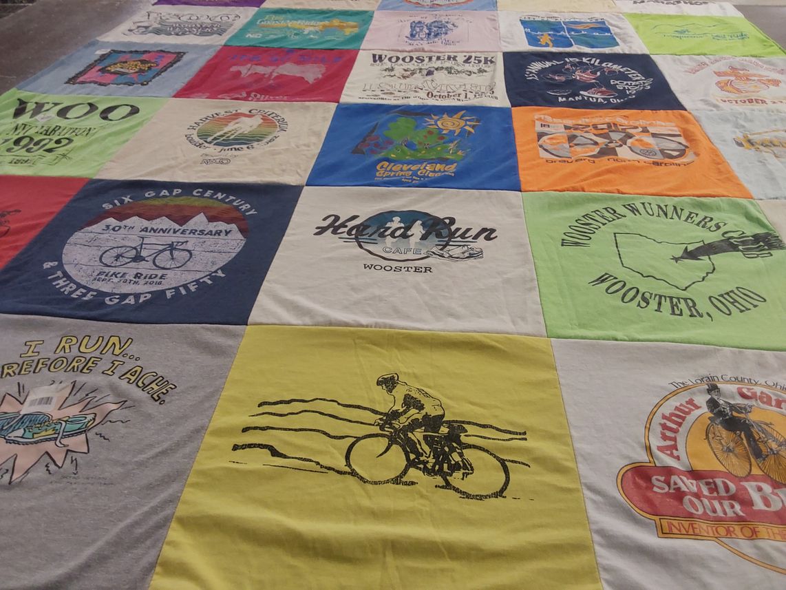 T-shirt quilt with running, cycling themes by Ginger from SC