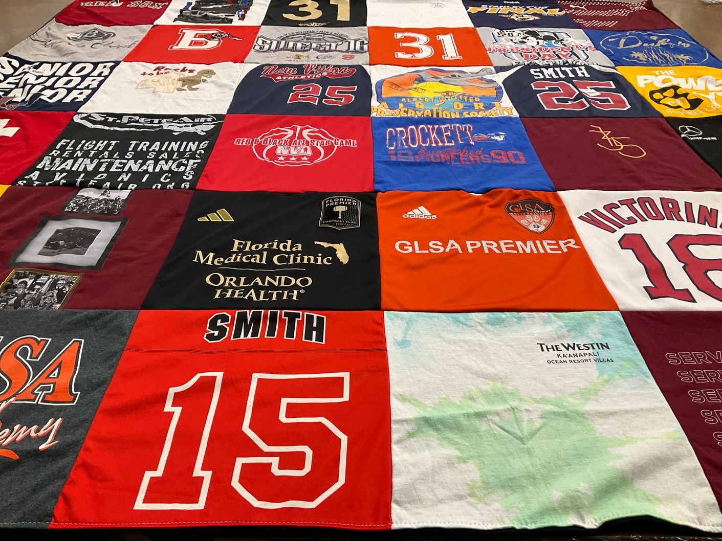 T-shirt quilt with sports, education themes by Adam from FL