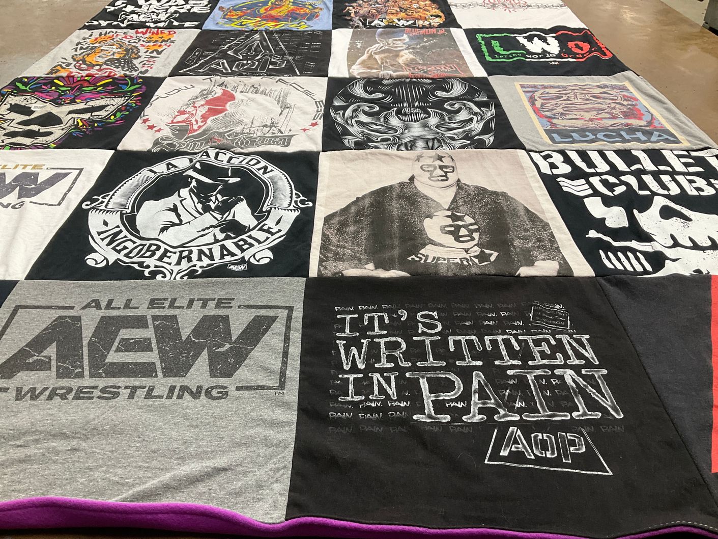 T-shirt quilt with wrestling themes by Mario from TX