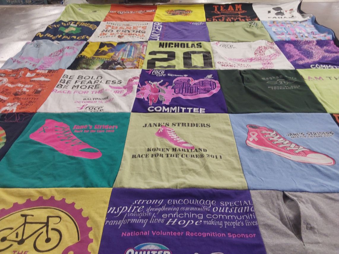 T-shirt quilt with health, community service themes by Agnes from MD