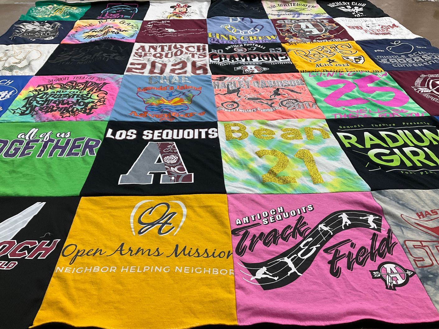 T-shirt quilt featuring antioch sequoit track field, antioch sequoit football by Michelle from IL