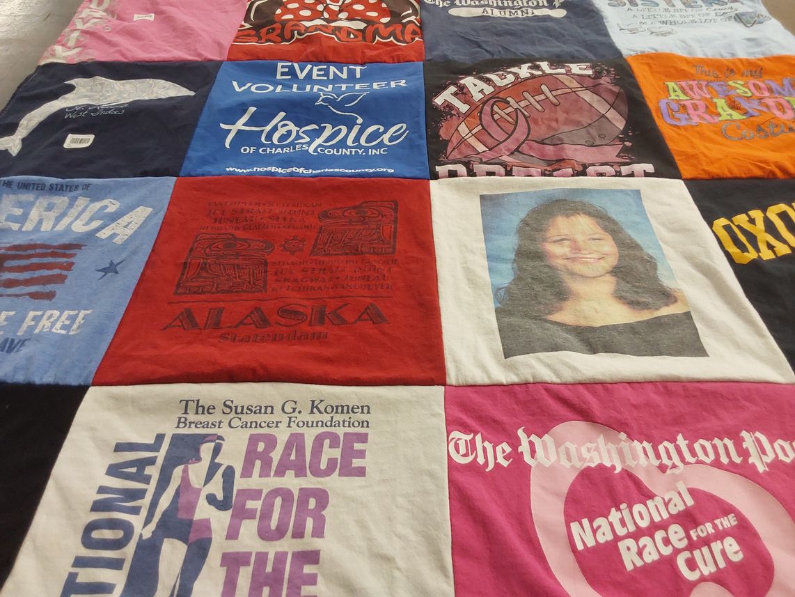 T-shirt quilt with volunteering, breast cancer awareness themes by Gayle from MD