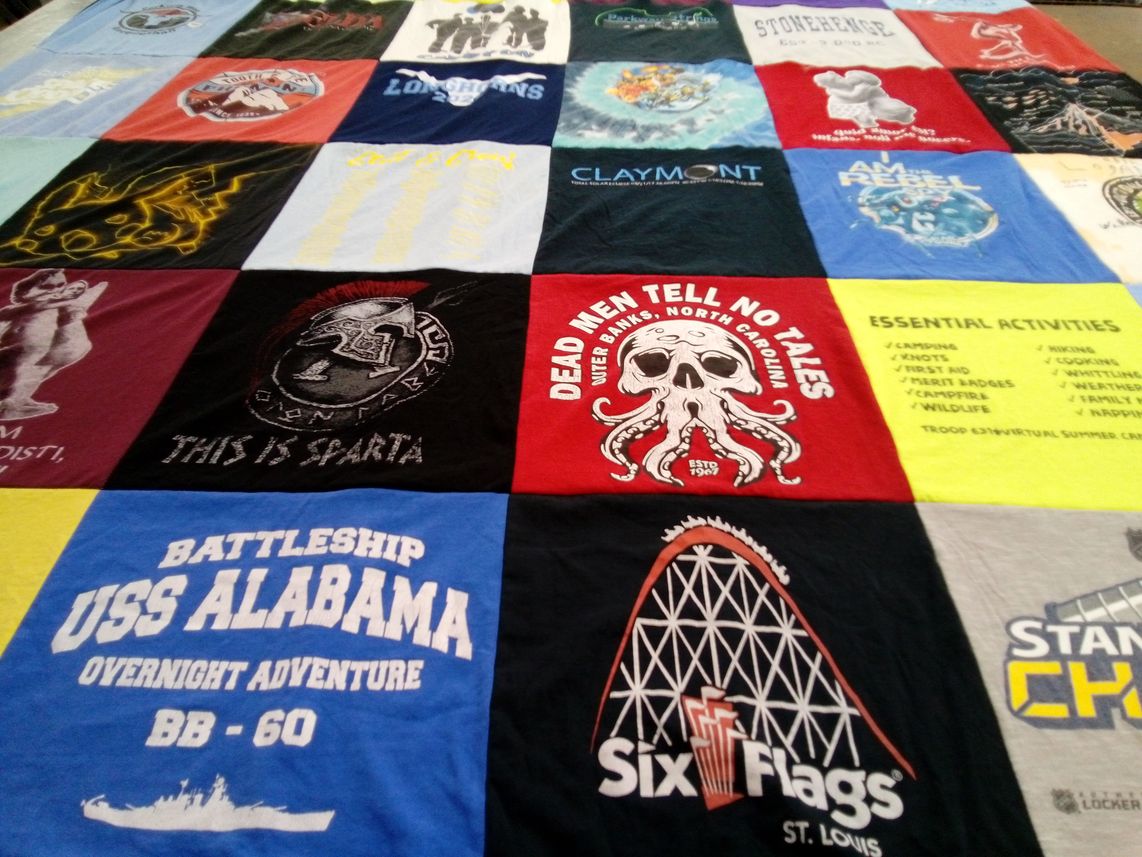 T-shirt quilt with camping, knitting themes by Margaret from MO