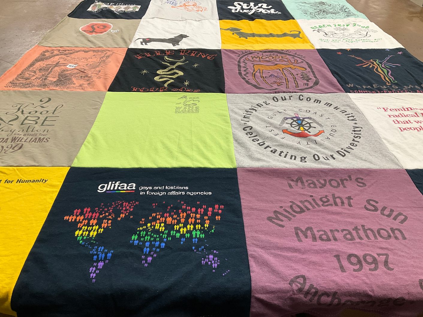 T-shirt quilt with community, diversity themes by Cynthia from MS