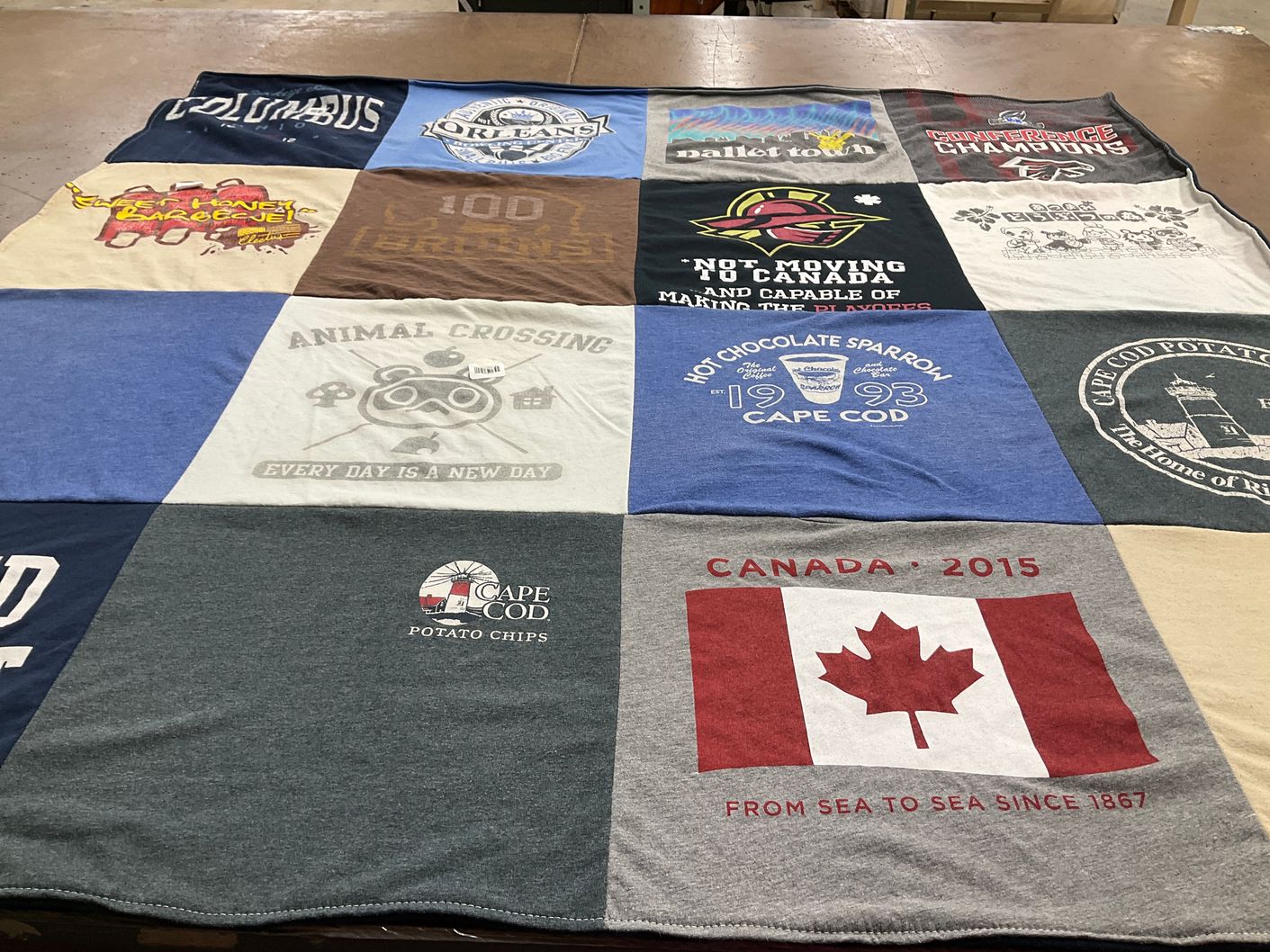 T-shirt quilt with gaming, travel themes by Emma from GA