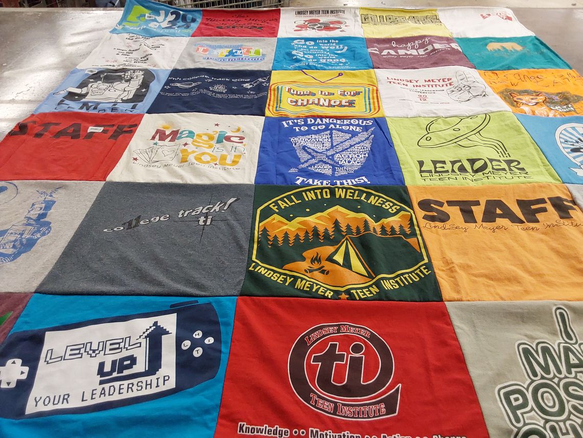 T-shirt quilt with education, leadership themes by Madeline from NJ