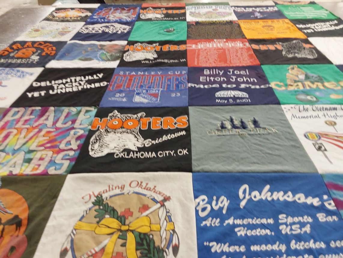 T-shirt quilt with music, sports themes by Michael from NY