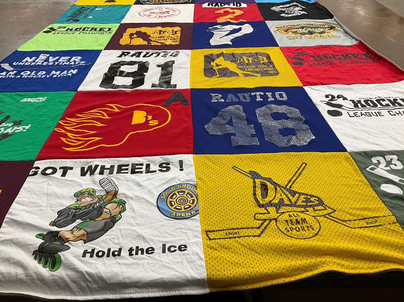 T-shirt quilt with hockey themes by Josh from AZ