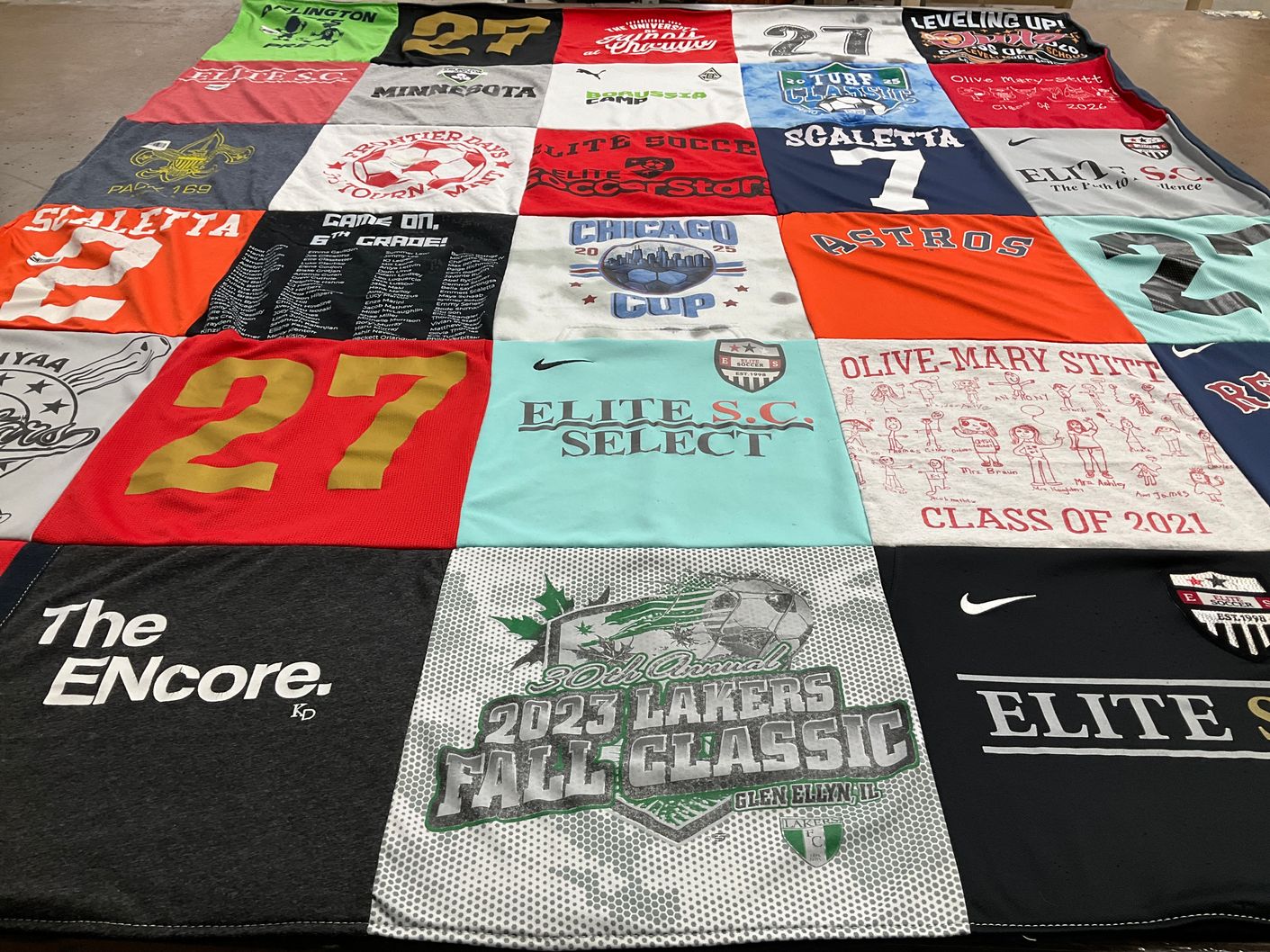 T-shirt quilt from olive-mary stitt school by Melissa from IL
