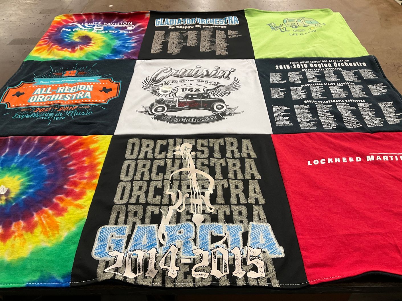T-shirt quilt with music, orchestras themes by Mary from TX