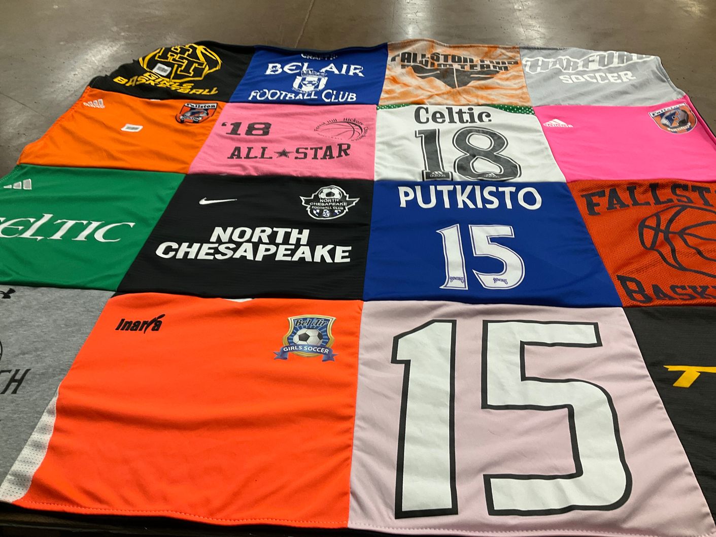 T-shirt quilt with soccer, basketball themes by Katie from MD
