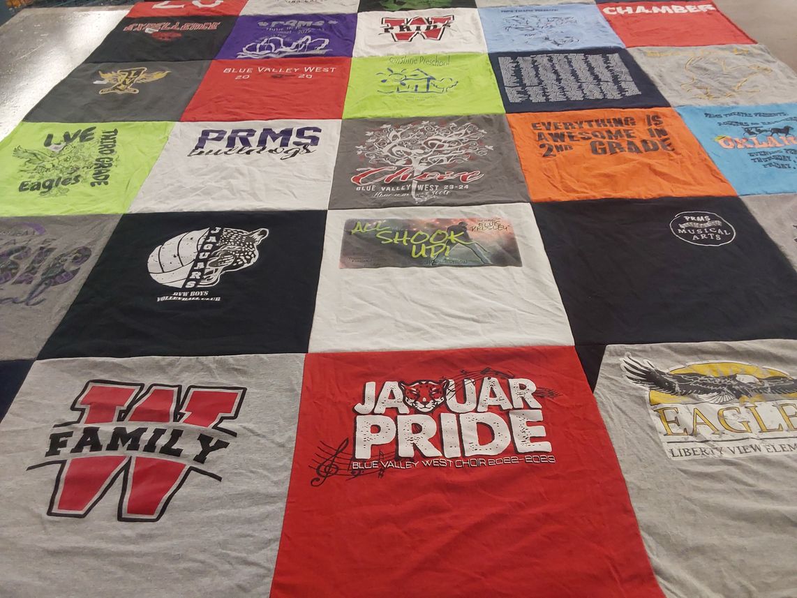 T-shirt quilt from blue valley west high school, liberty view elementary school by Aimee from KS