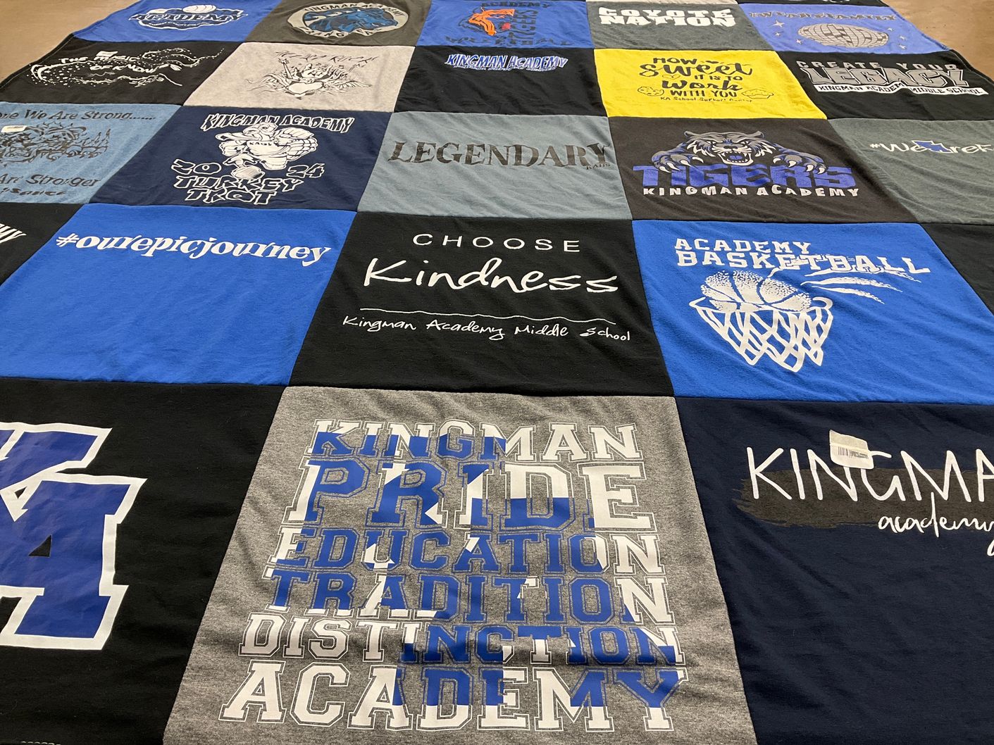T-shirt quilt featuring kingman academy tigers by Eric from AZ