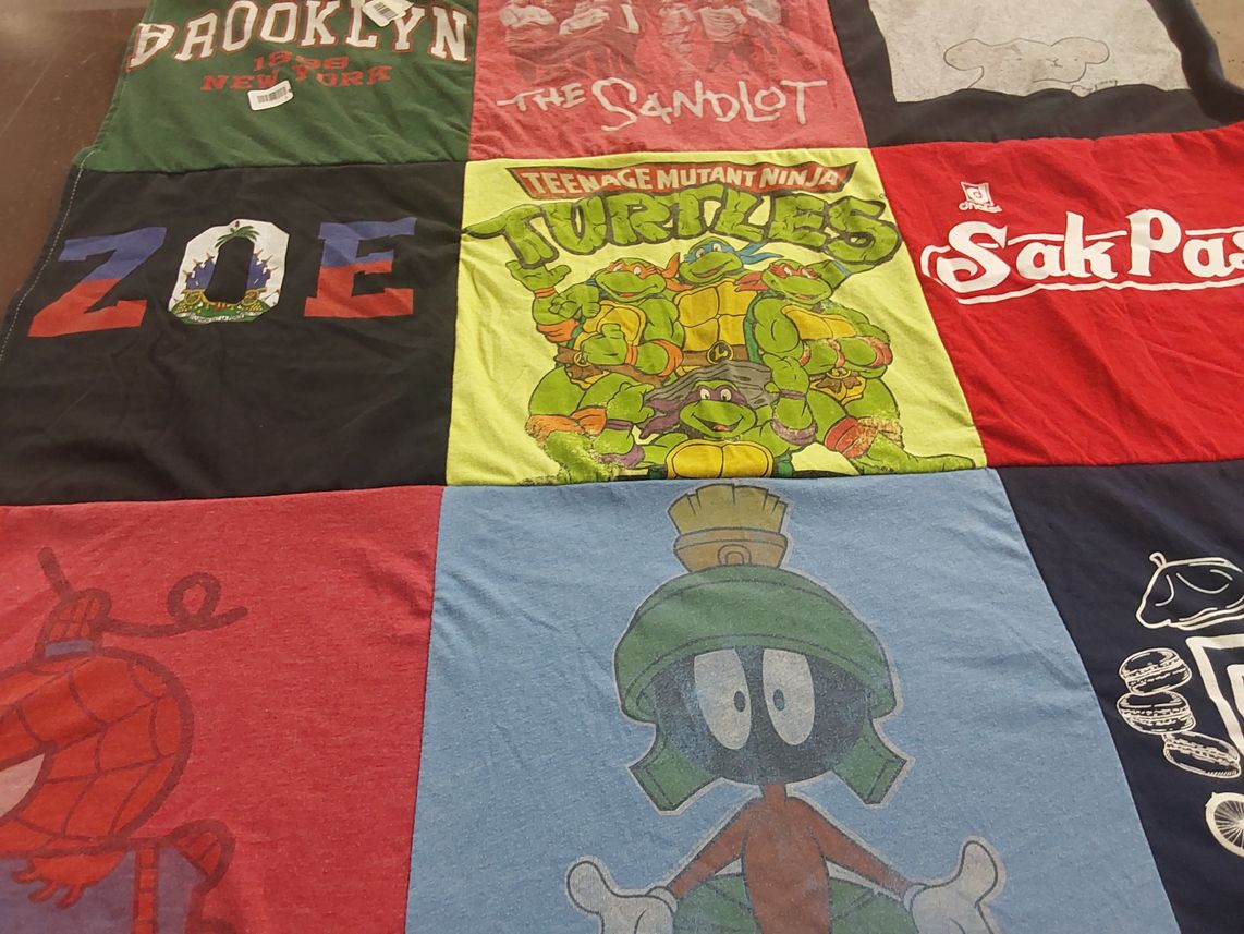T-shirt quilt with movies, cartoons themes by Rebecca from MD