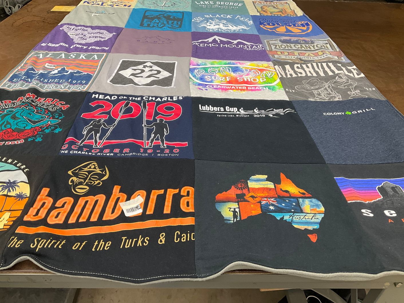 T-shirt quilt with travel, outdoor activities themes by Colleen from CT