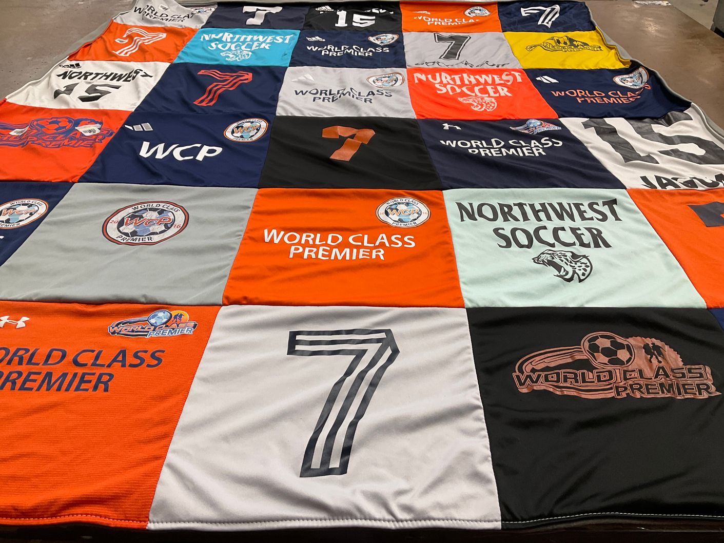 T-shirt quilt with soccer themes by Katy from MD