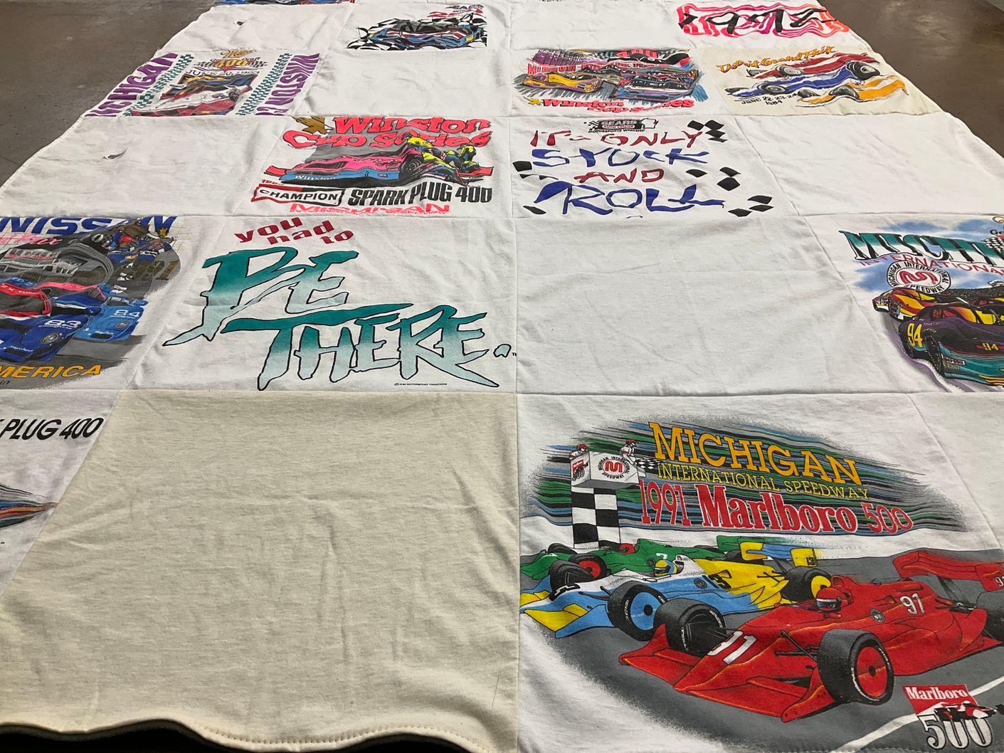T-shirt quilt with racing, motorsports themes by Kathy from ND