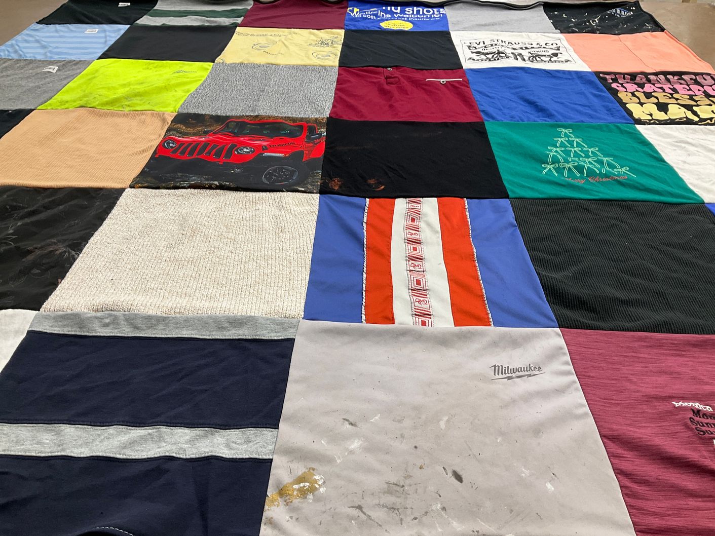 T-shirt quilt with cars, family themes by Liz from CA