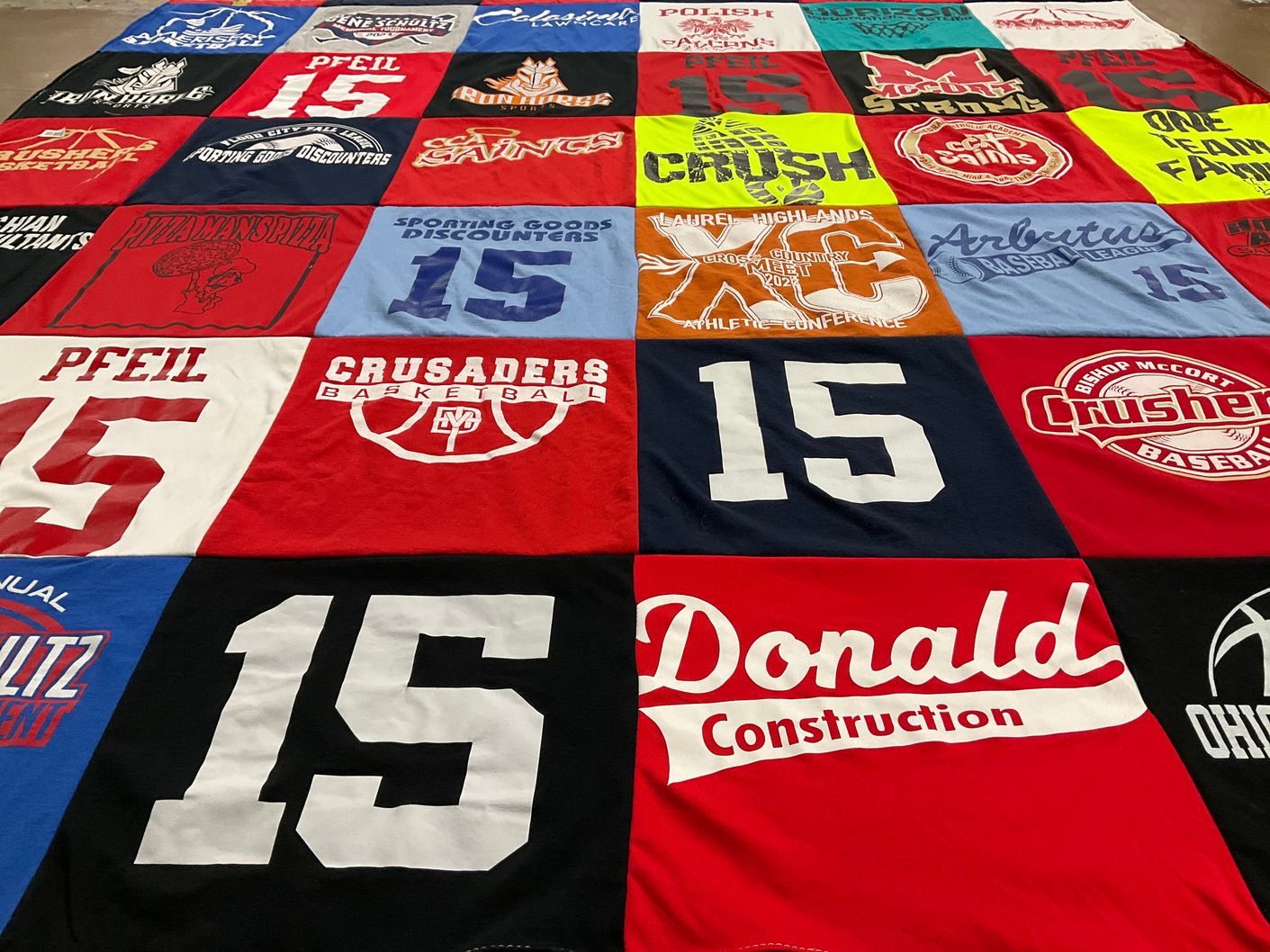 T-shirt quilt featuring crusaders basketball team by Sara from PA