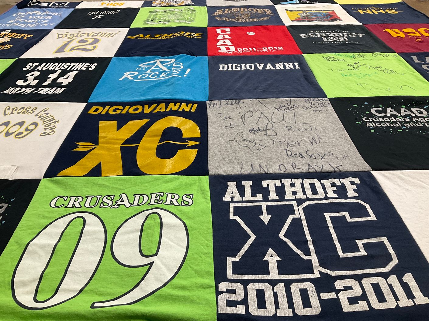 T-shirt quilt featuring althoff cross country team by Aimee from IL