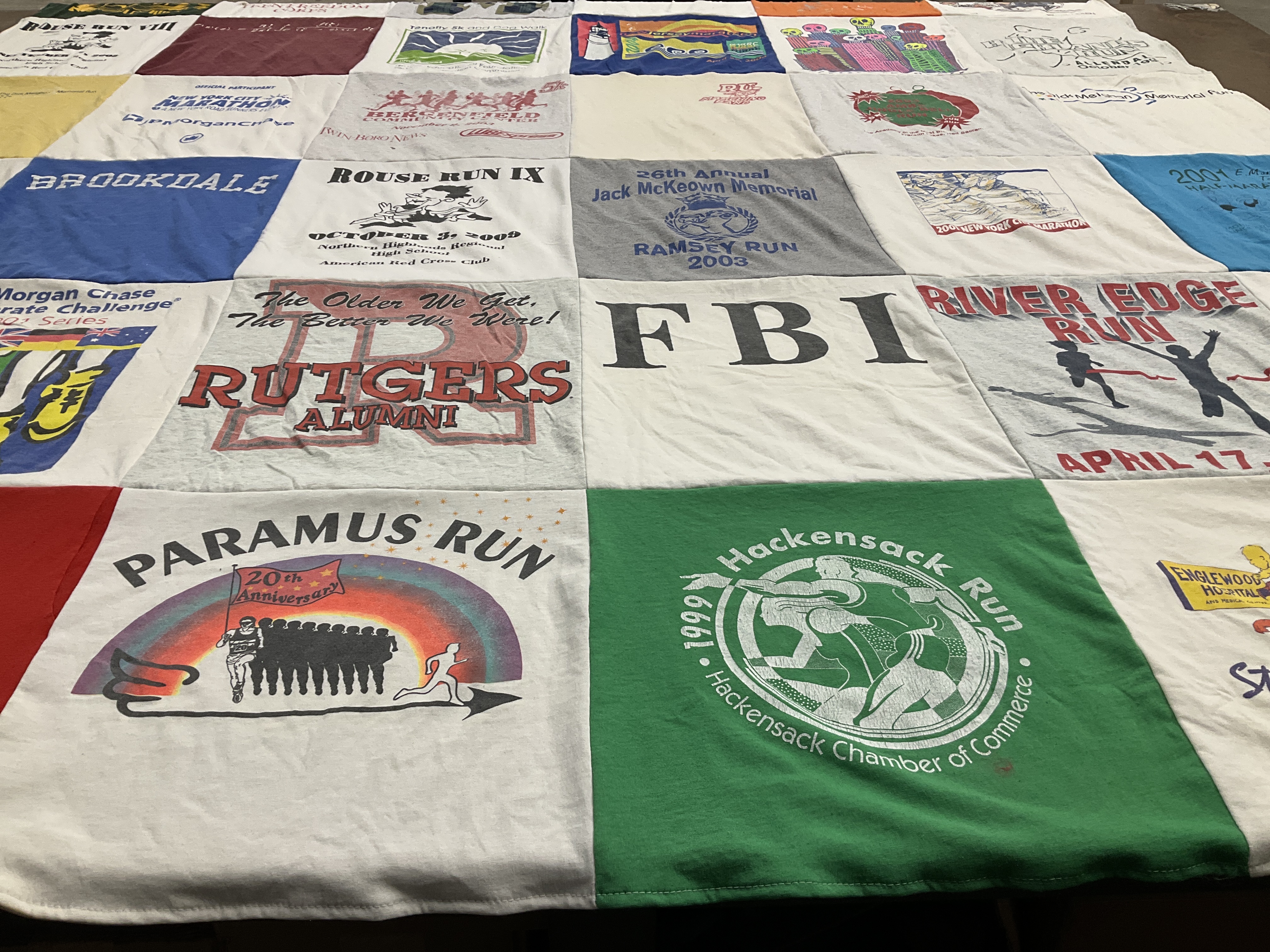 T-shirt quilt with running, community events themes by Elizabeth from NJ