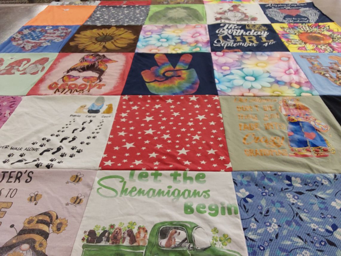 T-shirt quilt with family, celebrations themes by Carol from CA