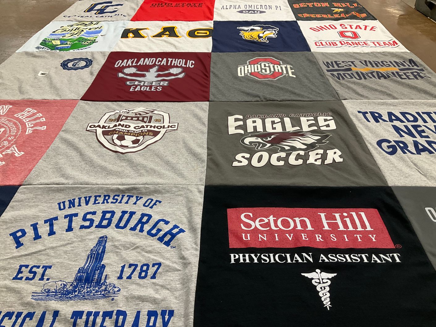 T-shirt quilt featuring west virginia mountaineers, ohio state university by Heidi from PA
