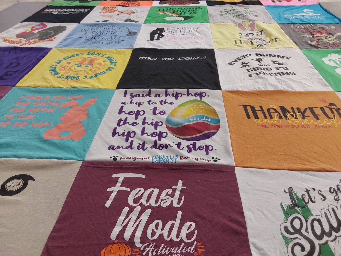 T-shirt quilt with music, hiking themes by Karin from MD