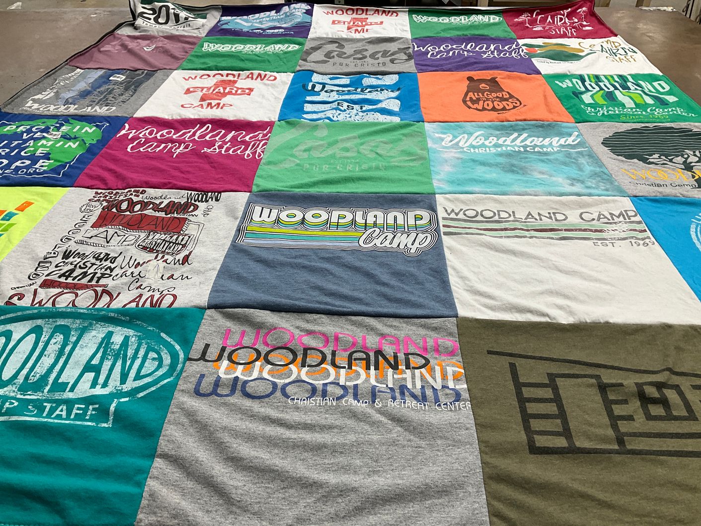 T-shirt quilt with camping, youth programs themes by Morgan from GA