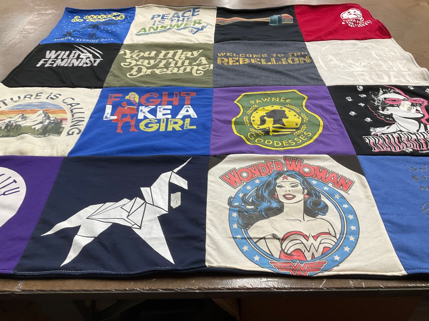 T-shirt quilt with feminism, nature themes by Kathy from MD