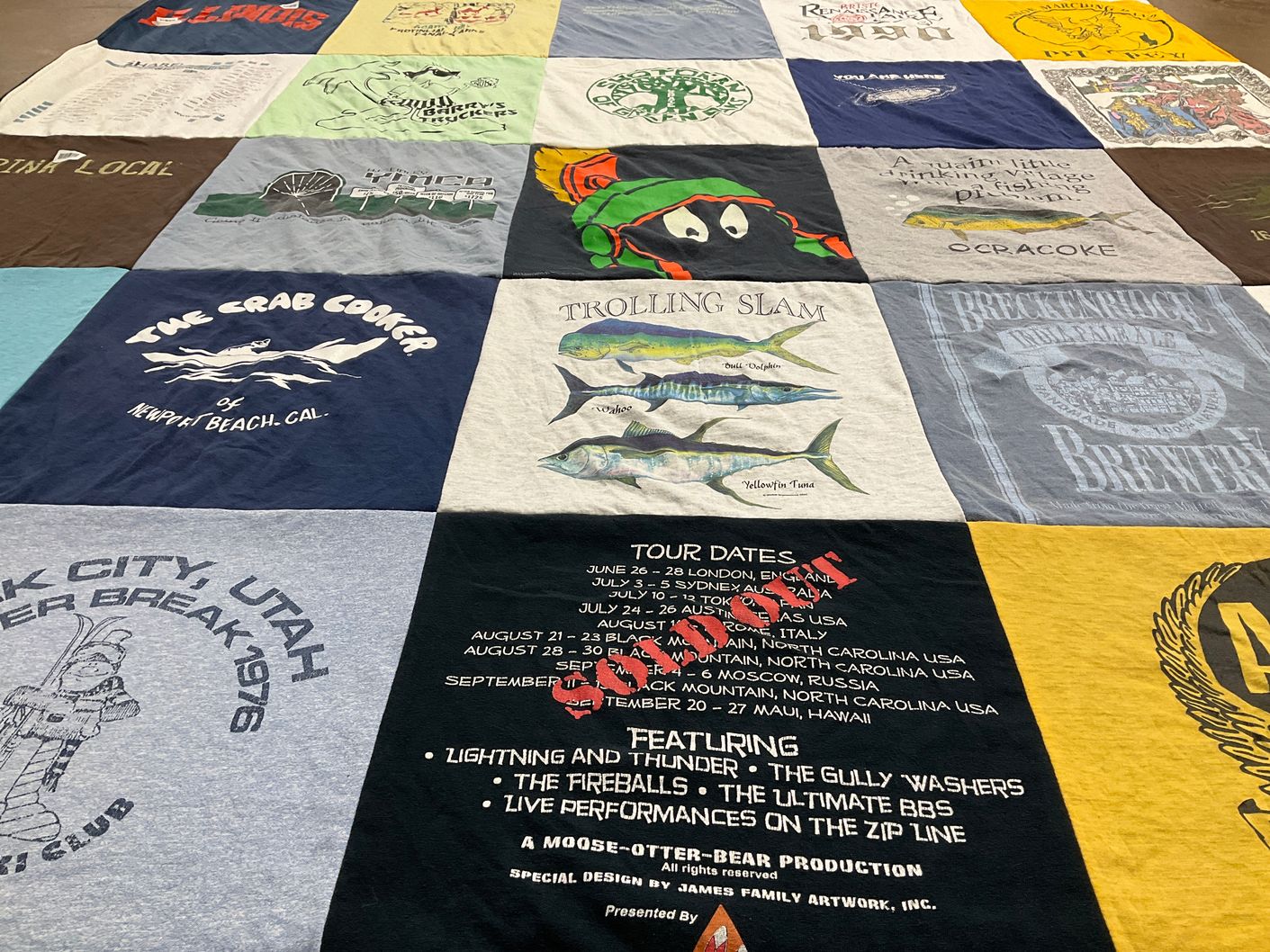 T-shirt quilt with fishing, music themes by Mary  from NC