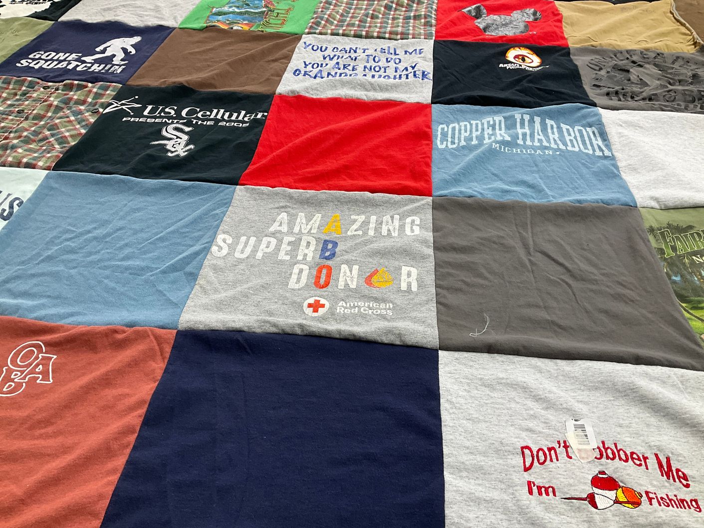 T-shirt quilt with outdoors, fishing themes by Donna from IL