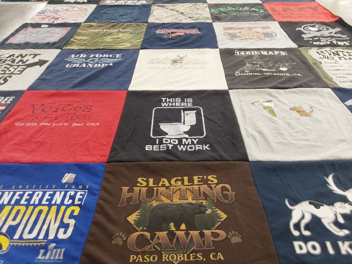 T-shirt quilt with hunting, sports themes by Sandra from CA