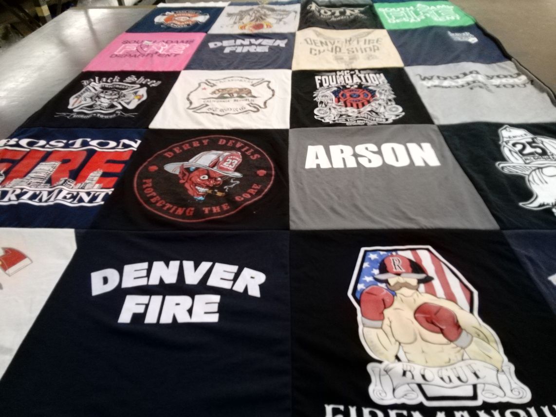 T-shirt quilt with firefighting, community themes by Filiberto from CO